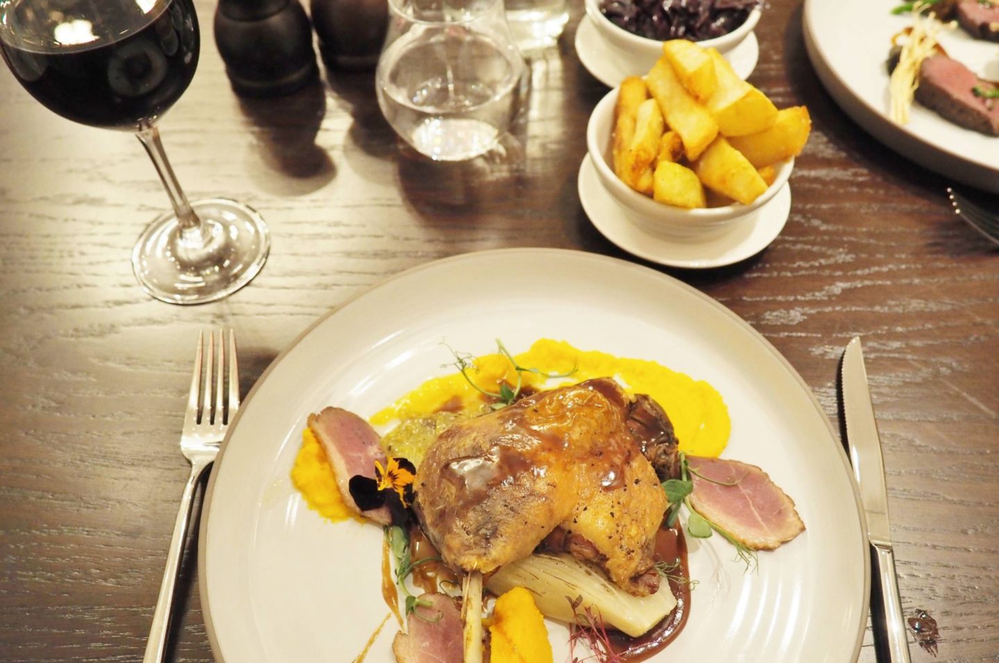Three Church Road Confit duck leg, butternut puree, chicory, curd duck breast, red wine jus